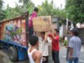 ChurchWorldService-Javaunloadingtruck.jpg